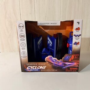 Sharper Image Blue and Black Cyclone Twister RC Car